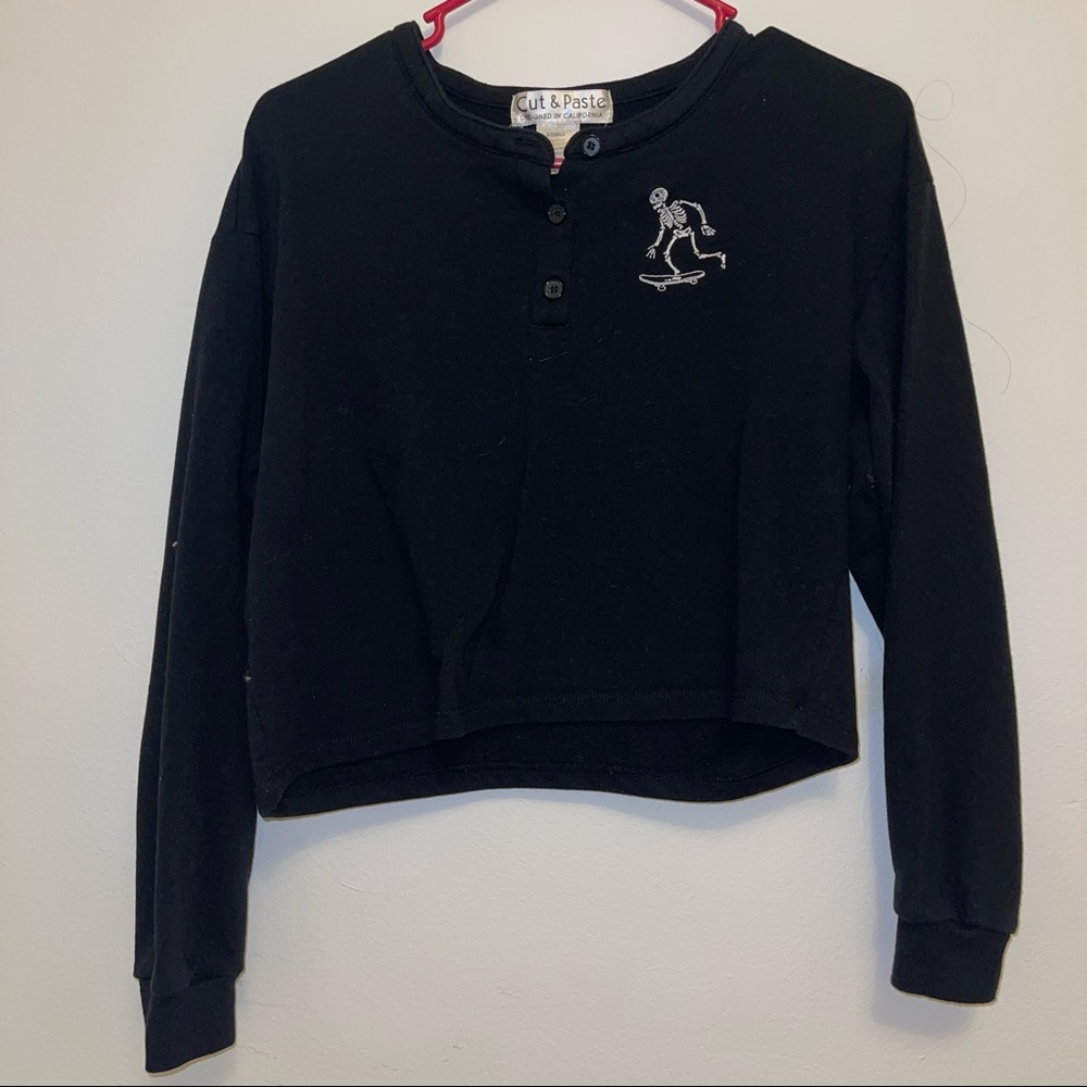 Embroidered skeleton on a skateboard pullover